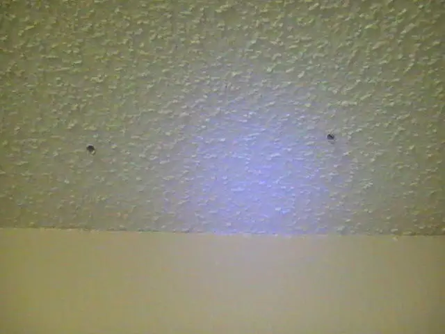 Holes drilled in ceiling for antenna pass-through