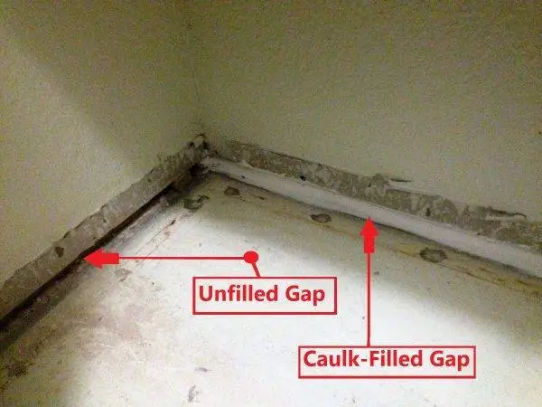 Caulked gap at floor for sound proofing
